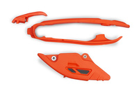 UFO KOMPLET ŚLIZG + PROWADNICA ŁAŃCUCHA KTM SX 125 / 250 / 300 '23-'25, SXF (SX-F) 250 / 350 / 450 '23-'25, EXC 150 / 250 / 300 '24-'25, EXCF (EXC-F) 350 / 450 / 500 '24-'25 KOLOR POMARAŃCZOWY (KT05017001 + KT05018001)